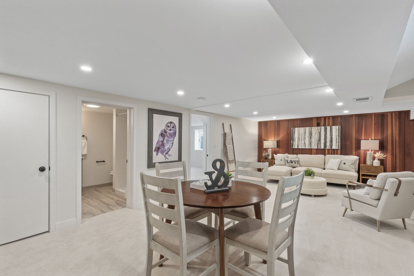 Lower level lounge with restored cedar accent wall