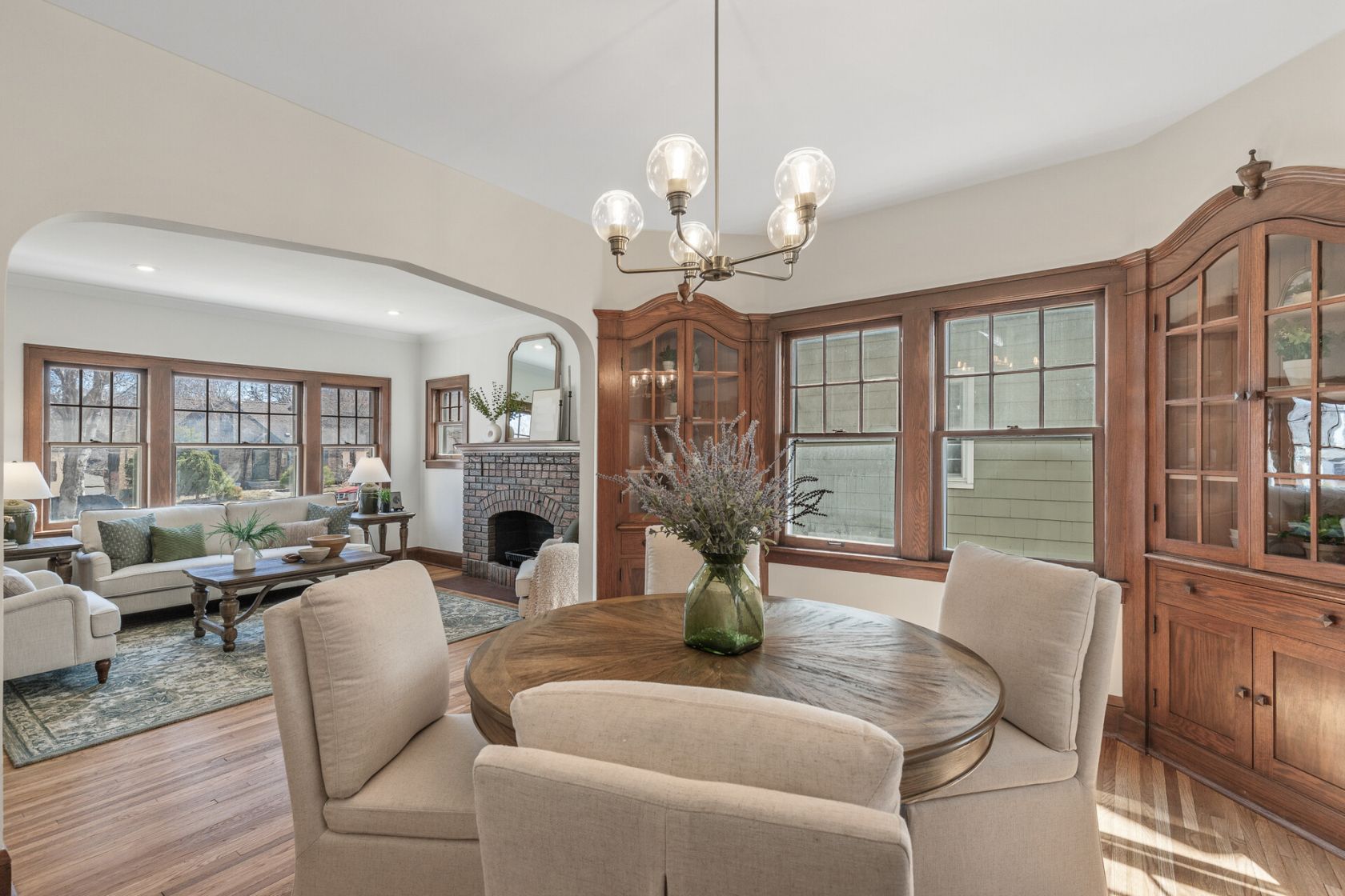 Dining room with restored built-ins and new globe chandelier