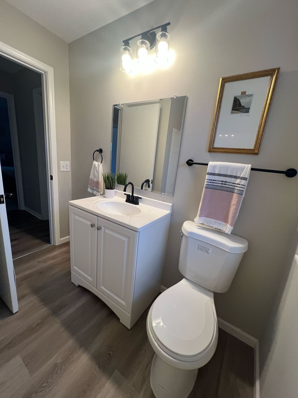 Refreshed bathroom with new vanity and fixtures